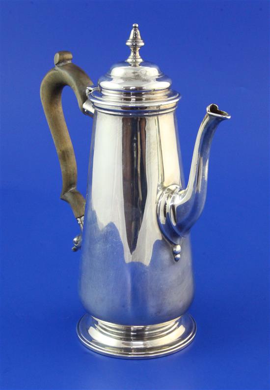 A late Victorian silver coffee pot, gross 14.5 oz.